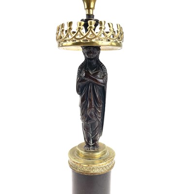 Lot 8 - A French bronze and ormolu figural candelabrum,...