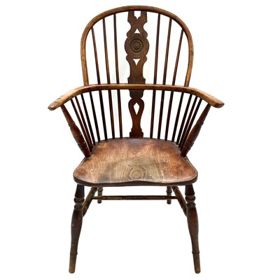Lot 83 - An elm, ash and fruitwood windsor armchair, 19th century.
