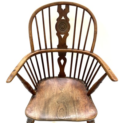 Lot 83 - An elm, ash and fruitwood windsor armchair, 19th century.