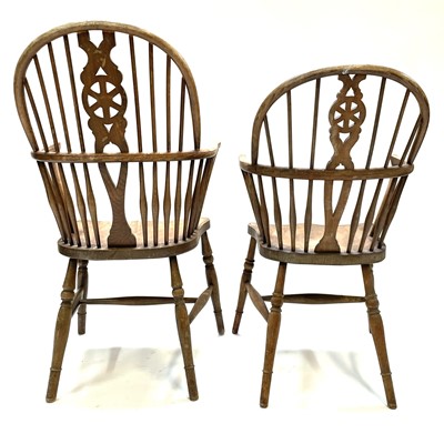 Lot 84 - A near matching pair of elm, beech and ash windsor armchairs, circa 1900.