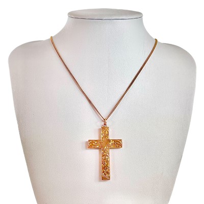 Lot 362 - A George V 9ct rose gold foliate engraved cross pendant.