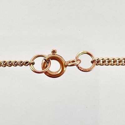 Lot 362 - A George V 9ct rose gold foliate engraved cross pendant.