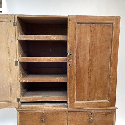 Lot 91 - A Victorian pine linen press, with a pair of panelled doors.