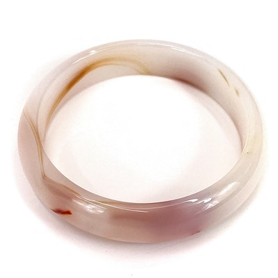 Lot 339 - An agate carved bangle.