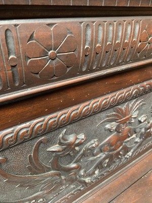 Lot 93 - A Victorian carved oak hall bench.