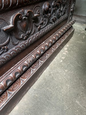 Lot 93 - A Victorian carved oak hall bench.