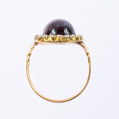 Lot 121 - A Georgian gold garnet and diamond set ring