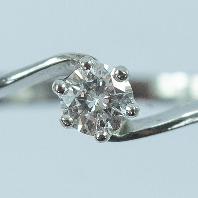 Lot 123 - An 18ct white gold diamond solitaire ring.