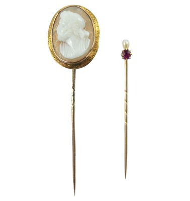 Lot 198 - Two Victorian gold stick pins.