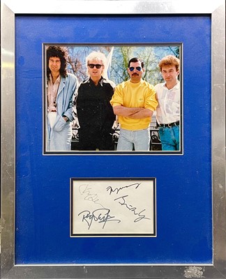 Lot 12 - A 'Queen' promotional photograph with a signed card