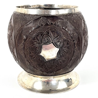 Lot 176 - A Georgian silver mounted coconut cup.