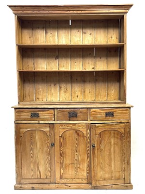 Lot 106 - A pine open bookcase, early 20th century.