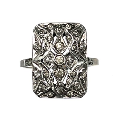 Lot 120 - A 9ct white gold and silver 1920's style white stone set ring