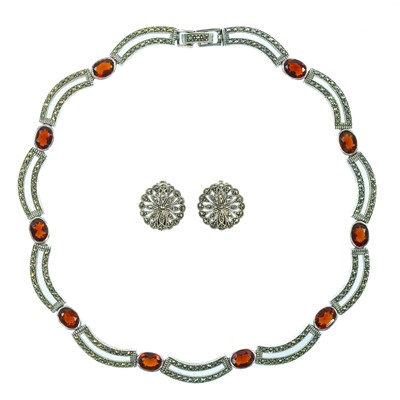 Lot 402 - A silver, garnet and mascasite set necklace and matching pair of earrings, stamped 925.