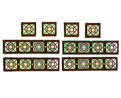 Lot 94 - A set of four Edwardian stained glass panels,...