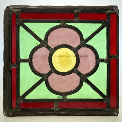 Lot 94 - A set of four Edwardian stained glass panels,...