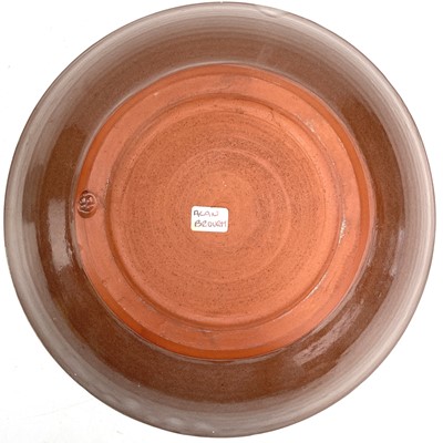 Lot 890 - An Alan Brough studio pottery dish, the centre...