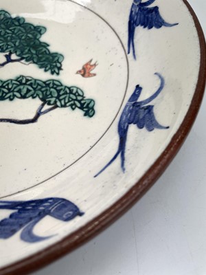Lot 890 - An Alan Brough studio pottery dish, the centre...