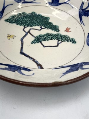Lot 890 - An Alan Brough studio pottery dish, the centre...