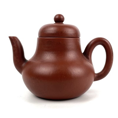 Lot 171 - A small Chinese Yixing teapot.