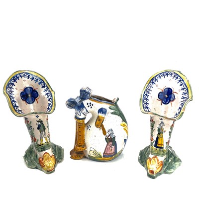 Lot 874 - A pair of Quimper cornucopia vases, with hand...