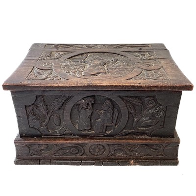 Lot 117 - A small carved oak box, late 17th/early 18th century.