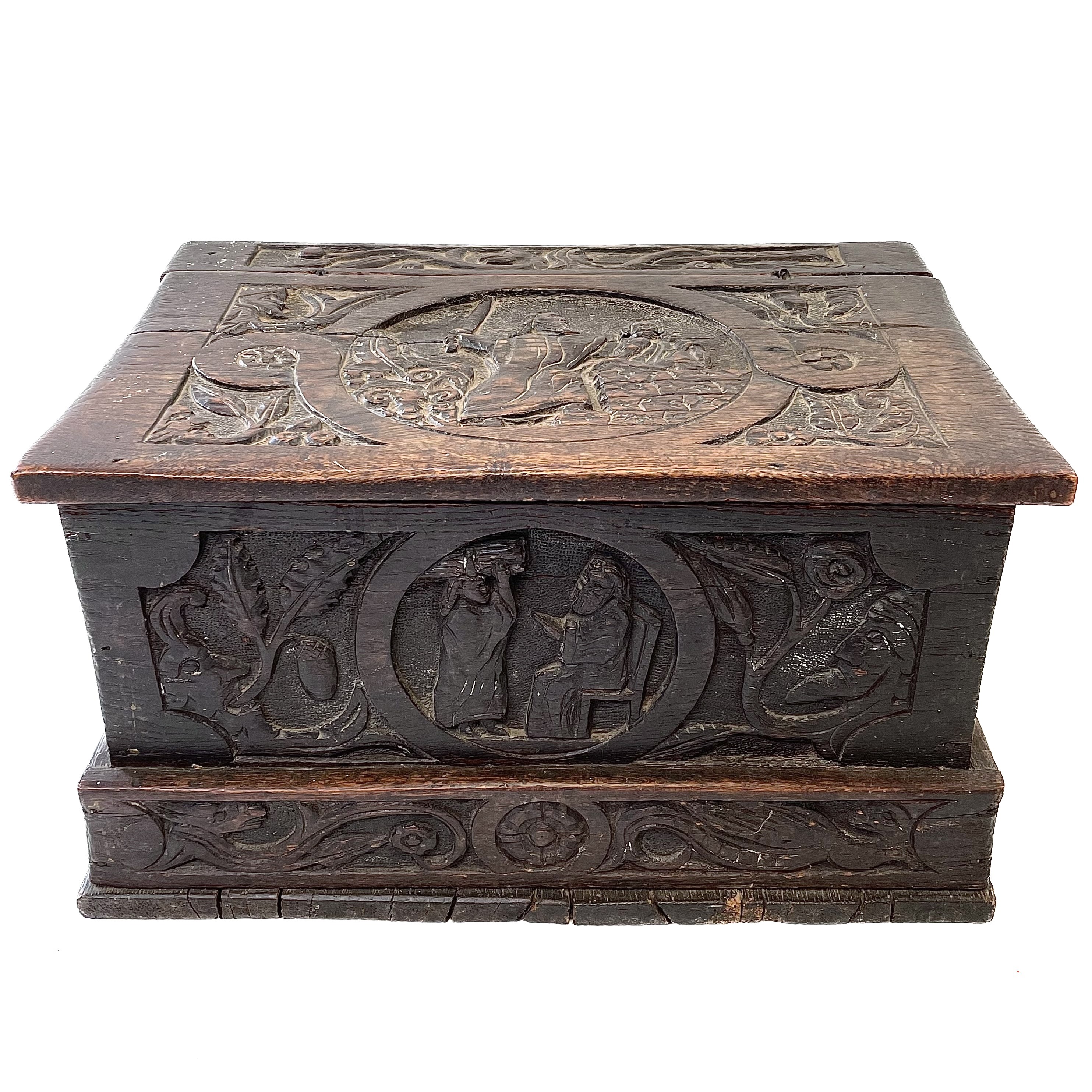 Lot 117 - A small carved oak box, late 17th/early 18th