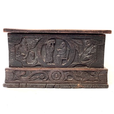 Lot 117 - A small carved oak box, late 17th/early 18th century.