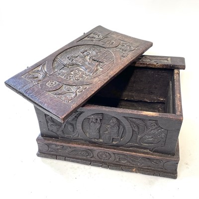 Lot 117 - A small carved oak box, late 17th/early 18th century.