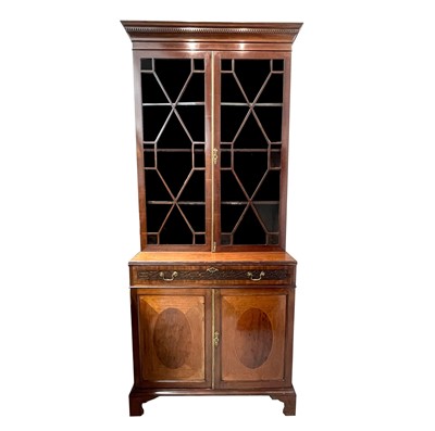 Lot 1849 - A late Victorian mahogany cabinet bookcase, in...