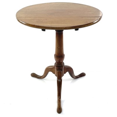 Lot 1807 - A walnut circular tripod table, 19th century,...