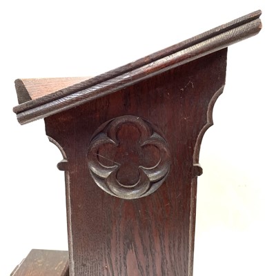 Lot 118 - A Gothic oak prayer stool, circa 1900.