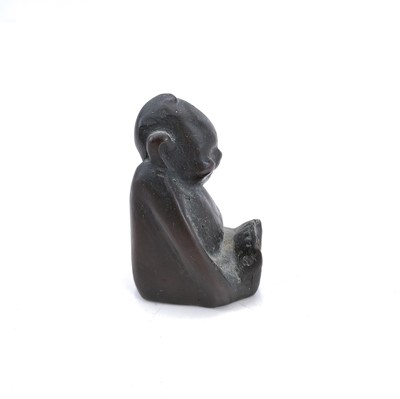 Lot 39 - A Chinese bronze figure of a seated baby, 19th century.