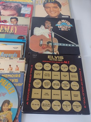 Lot 71 - ELVIS PRESLEY - Forty-seven 12" records together with.