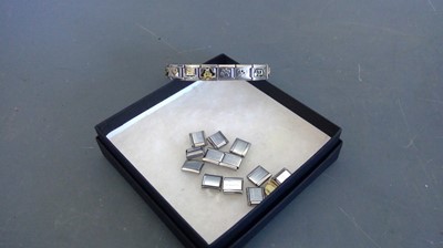Lot 70 - A Nomination stainless steel bracelet with...