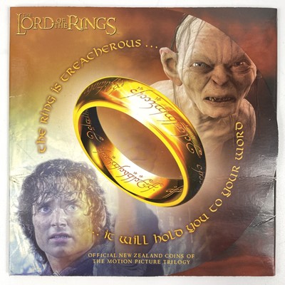 Lot 132 - New Zealand Uncirculated Bank Note and Coin Sets (x5) Including Lord of the Rings interest.