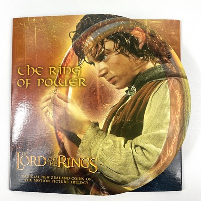 Lot 132 - New Zealand Uncirculated Bank Note and Coin Sets (x5) Including Lord of the Rings interest.