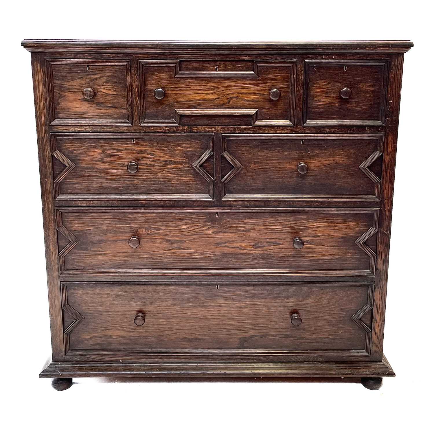 Lot 108 - A Jacobean style oak chest of drawers, 20th