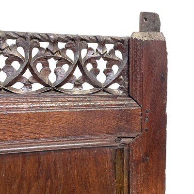 Lot 111 - Three sections of oak panelling, 17th century.