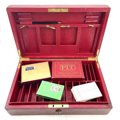 Lot 18 - A red Morocco leather games box, by Clark, 20,...