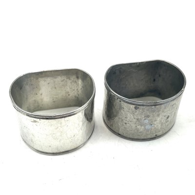 Lot 172 - Two Cornish Tin napkin rings, circa 1930's,...