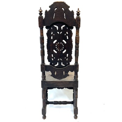 Lot 119 - A carved oak high back hall chair,19th century.