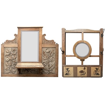 Lot 1812 - An Arts and Crafts oak hall mirror, with...