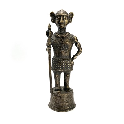 Lot 202 - A Benin style bronze figure of a warrior with...