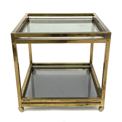 Lot 1840 - A brass and smoked glass square two-tier...