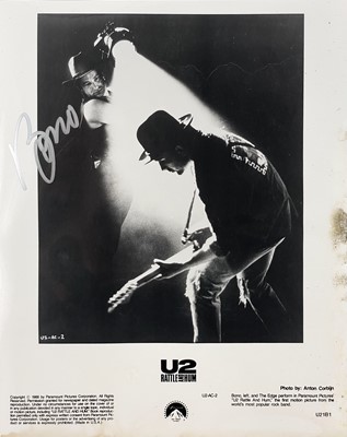 Lot 138 - A signed 'Bono' promotional photograph for the album Rattle and Hum.