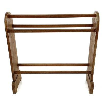 Lot 1871 - An Arts and Crafts style teak towel rail, with...