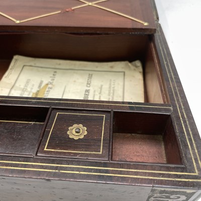 Lot 101 - A William IV rosewood and brass inlaid writing...