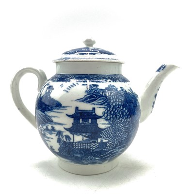 Lot 824 - A blue and white teapot and cover, probably...