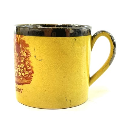 Lot 127 - An early Victorian canary yellow nursery mug.